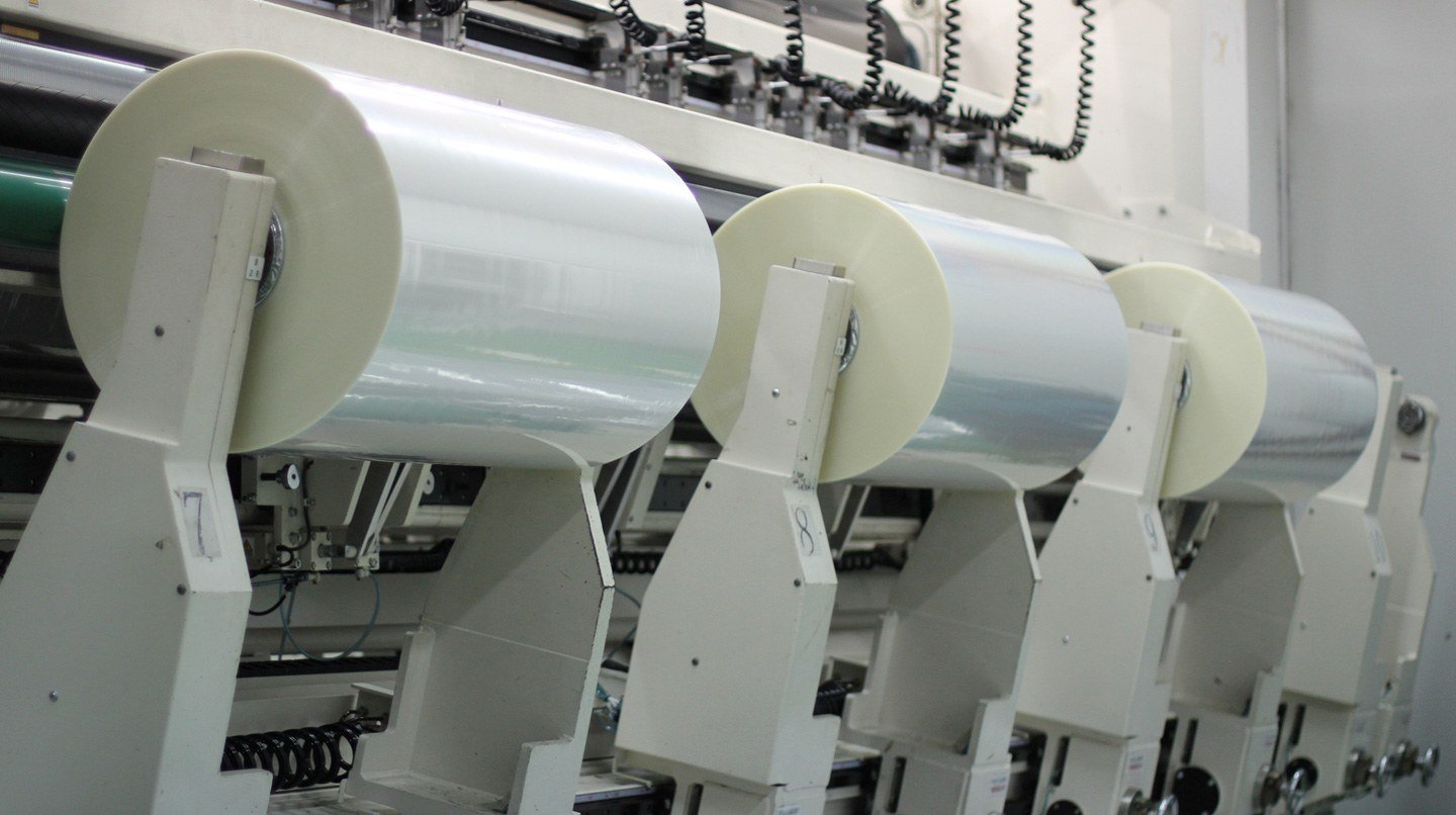 BOPA nylon film rolls on the slitting line at OLUNRO